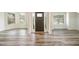 Bright entryway with vinyl flooring and multiple windows at 4203 Shandi Cv, Hoschton, GA 30548