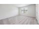 Well-lit bedroom with neutral carpet and ample space at 4203 Shandi Cv, Hoschton, GA 30548