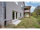 Exterior of house with raised deck and partial view at 4203 Shandi Cv, Hoschton, GA 30548