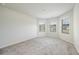 Bedroom with bay window, neutral carpet and plenty of light at 4203 Shandi Cv, Hoschton, GA 30548
