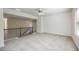 Spacious loft area with carpeted floor and ceiling fan at 4203 Shandi Cv, Hoschton, GA 30548