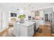 Spacious kitchen featuring a large island and white cabinetry at 145 Oak Forest Dr, Oxford, GA 30054