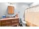Bathroom with a vanity and shower/tub combo at 145 Oak Forest Dr, Oxford, GA 30054
