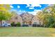 Large two-story house with brick and siding exterior at 145 Oak Forest Dr, Oxford, GA 30054