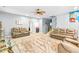 Finished basement recreation area with comfortable seating at 145 Oak Forest Dr, Oxford, GA 30054