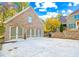 Spacious three-car garage with ample parking space at 145 Oak Forest Dr, Oxford, GA 30054