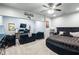 Spacious main bedroom with a large bed and a sitting area at 145 Oak Forest Dr, Oxford, GA 30054