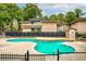 Community pool with surrounding patio and fence at 346 Carpenter Dr # 16, Sandy Springs, GA 30328