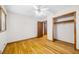 Bedroom with hardwood floors, ceiling fan and closet at 2639 Odum St, Snellville, GA 30078