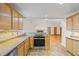 Spacious kitchen with granite countertops and oak cabinets at 2639 Odum St, Snellville, GA 30078