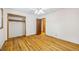 Bedroom with hardwood floors, ceiling fan and closet at 2639 Odum St, Snellville, GA 30078