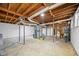 Spacious unfinished basement with high ceilings at 2639 Odum St, Snellville, GA 30078