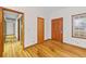 Hardwood floors and doors leading to other rooms of the home at 2639 Odum St, Snellville, GA 30078