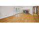Large living room with hardwood floors, fireplace and French doors at 2639 Odum St, Snellville, GA 30078