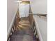 Wooden staircase leading down to the basement at 2639 Odum St, Snellville, GA 30078