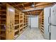 Unfinished basement with ample storage shelving at 2639 Odum St, Snellville, GA 30078