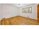Bright bedroom with hardwood floors and ceiling fan at 2639 Odum St, Snellville, GA 30078