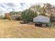 Rustic double-car garage with additional storage at 15 Moores Spring Rd, Kingston, GA 30145