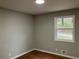 Bright bedroom with hardwood floors and a large window at 3666 Elkridge Dr, Decatur, GA 30032