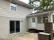 Newly painted house with patio, sliding glass door, and sunroom at 3666 Elkridge Dr, Decatur, GA 30032