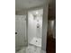 Stand-up shower with white subway tile and a rain shower head at 3666 Elkridge Dr, Decatur, GA 30032