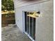 Rear exterior of house with sliding glass door and patio at 3666 Elkridge Dr, Decatur, GA 30032