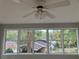 Sunroom with ceiling fan and multiple windows at 3666 Elkridge Dr, Decatur, GA 30032