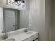Double vanity bathroom with large mirror and updated fixtures at 3666 Elkridge Dr, Decatur, GA 30032