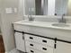 Bathroom with white shaker cabinets and a black hardware at 3666 Elkridge Dr, Decatur, GA 30032