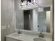 Double vanity bathroom with large mirror and updated fixtures at 3666 Elkridge Dr, Decatur, GA 30032