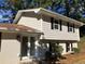 Newly painted house with white front door and landscaping at 3666 Elkridge Dr, Decatur, GA 30032