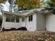 Newly painted house with sunroom and patio area at 3666 Elkridge Dr, Decatur, GA 30032