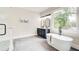 Luxurious bathroom with soaking tub, double vanity, and walk-in shower at 923 Oak Dr, Woodstock, GA 30189