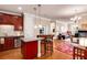 Open kitchen with granite counters, stainless steel appliances, and breakfast bar at 2300 Peachford Rd # 1209, Atlanta, GA 30338