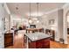 Kitchen island with granite top and hardwood floors at 2300 Peachford Rd # 1209, Atlanta, GA 30338