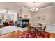 Cozy dining area with hardwood floors and fireplace at 2300 Peachford Rd # 1209, Atlanta, GA 30338