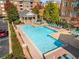 Community pool with plenty of lounge chairs at 2300 Peachford Rd # 1209, Atlanta, GA 30338