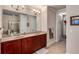 Double vanity bathroom with a large walk-in shower and access to the closet at 2300 Peachford Rd # 1209, Atlanta, GA 30338