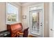 Home office with built-in desk and access to a private balcony at 2300 Peachford Rd # 1209, Atlanta, GA 30338