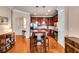 Kitchen with granite counters, dark wood cabinets, and breakfast bar at 2300 Peachford Rd # 1209, Atlanta, GA 30338