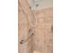 Walk-in shower with grab bar and handheld shower head at 2300 Peachford Rd # 1209, Atlanta, GA 30338