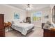 Comfortable bedroom with a double bed and built-in shelving at 2300 Peachford Rd # 1209, Atlanta, GA 30338