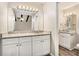 Double vanity bathroom with granite countertops at 3276 Marlanta Dr, Marietta, GA 30062