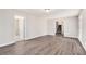 Open living area with hardwood floors and access to upper level at 3276 Marlanta Dr, Marietta, GA 30062