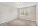 Charming bedroom with new carpet and updated wainscoting at 3276 Marlanta Dr, Marietta, GA 30062