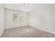 Bright bedroom with new carpet and large windows at 3276 Marlanta Dr, Marietta, GA 30062