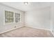 Spacious bedroom featuring neutral walls and plush carpeting at 3276 Marlanta Dr, Marietta, GA 30062