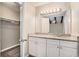 Bathroom with granite vanity and walk-in closet at 3276 Marlanta Dr, Marietta, GA 30062