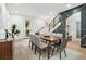 Modern dining room with wood table and access to backyard at 1695 North Nw Ave, Atlanta, GA 30318