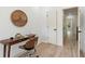 Bright home office with wood desk and chair near hallway at 1695 North Nw Ave, Atlanta, GA 30318
